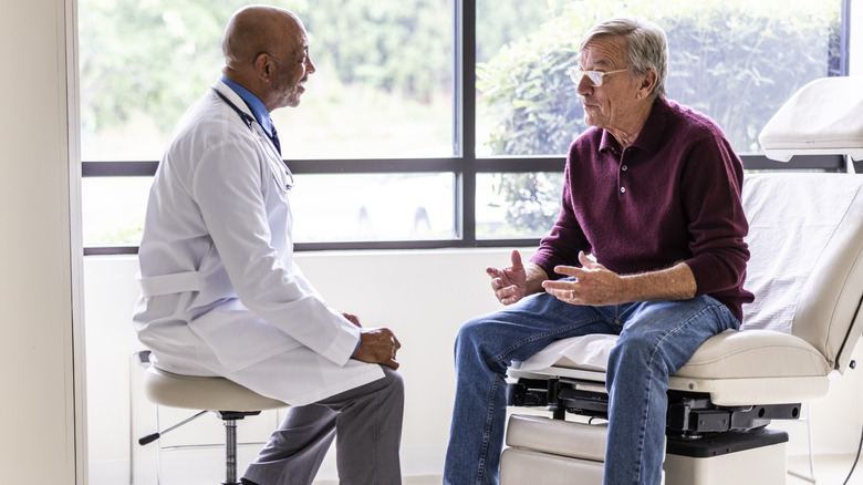 Man talking to doctor in the office